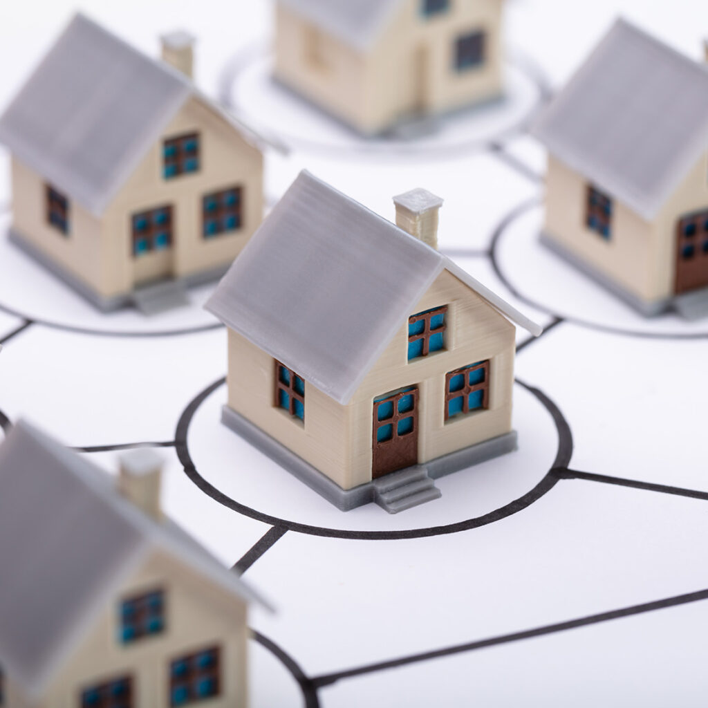 a bunch of tiny model houses in circle outlines